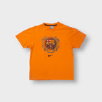 Nike FC Barcelona orange T-Shirt with a printed crest graphic and embroidered swoosh.