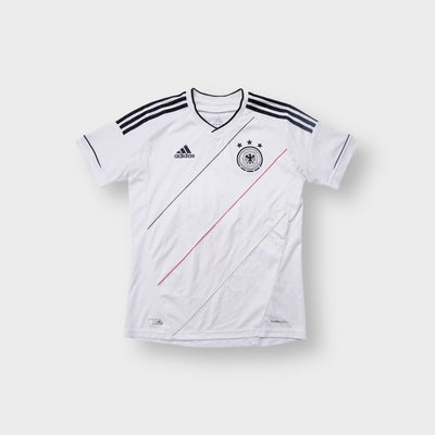 Adidas DFB white jersey featuring black stripes on the shoulders and a national team badge on the chest