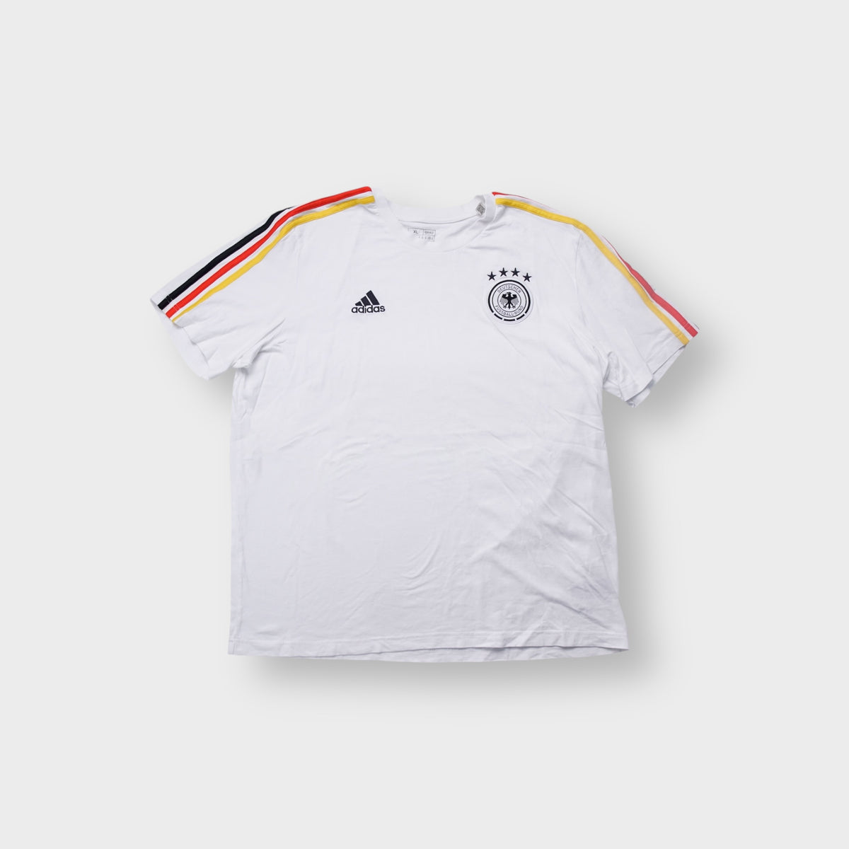 White Adidas DFB T-Shirt featuring the German crest print and shoulder stripes