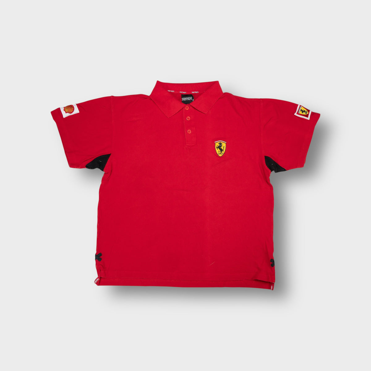 Ferrari polo shirt in red featuring an embroidered Scuderia horse shield patch