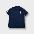 Ralph Lauren polo shirt in navy blue with a large white embroidered pony logo