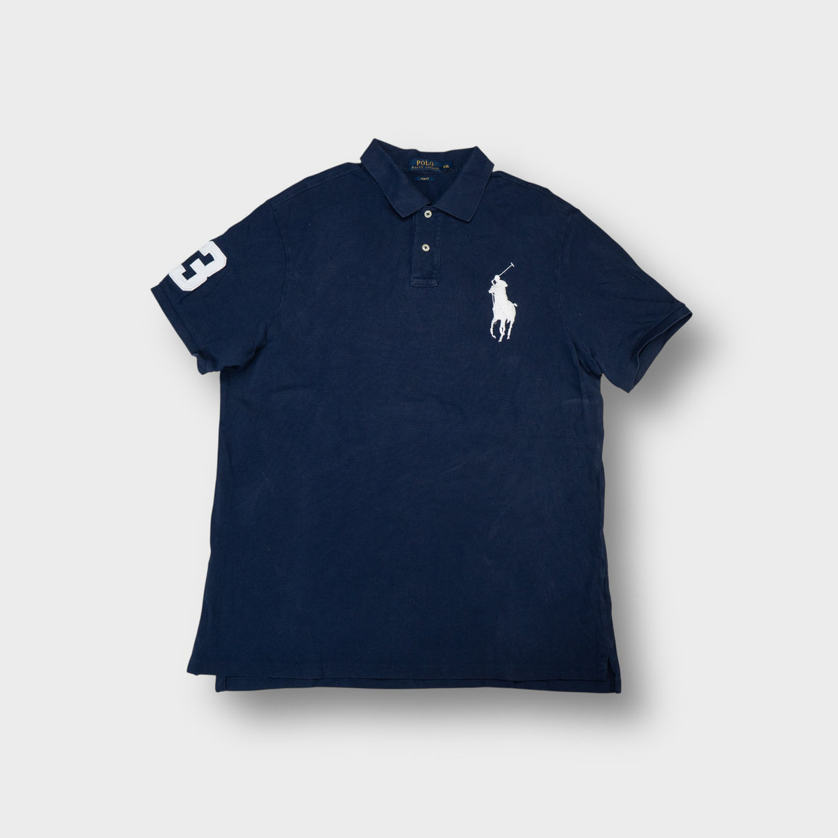 Ralph Lauren polo shirt in navy blue with a large white embroidered pony logo