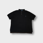 Ralph Lauren polo shirt in black with contrast orange stitching and blue chest logo