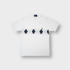 Fred Perry polo shirt in white featuring a blue and red argyle chest pattern