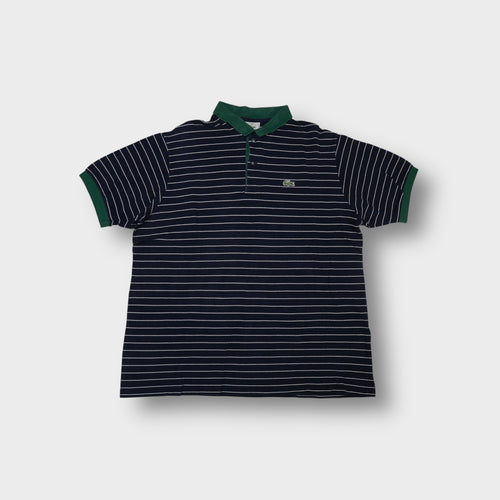 Lacoste striped navy polo shirt with a contrasting green collar and crocodile logo patch