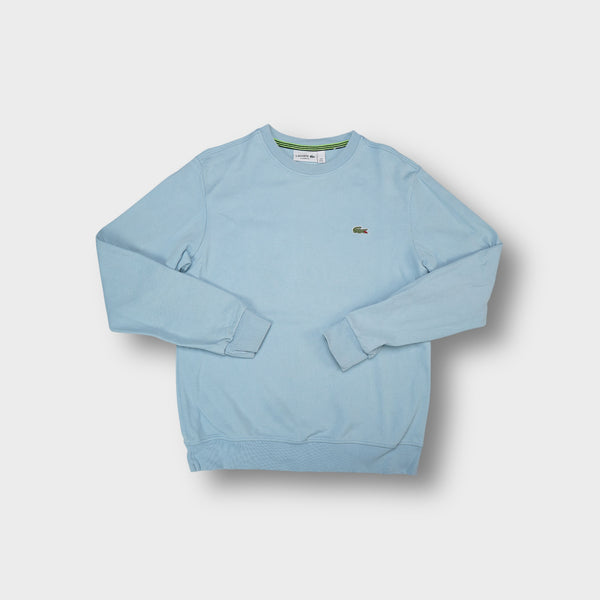 Lacoste sweater in light blue with embroidered crocodile logo on the chest