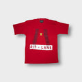 Ferrari T-Shirt in red featuring a Pit Lane print with black tire tracks and emblem.