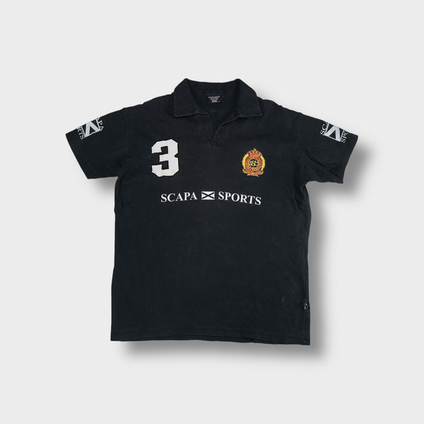 Scapa Sports polo shirt in black with embroidered crest and white number 3 patch