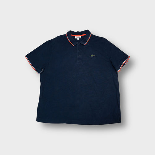 Lacoste polo shirt in dark blue with contrast trim collar and crocodile patch