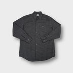 Lacoste long-sleeve shirt in black and white stripes with crocodile logo on chest