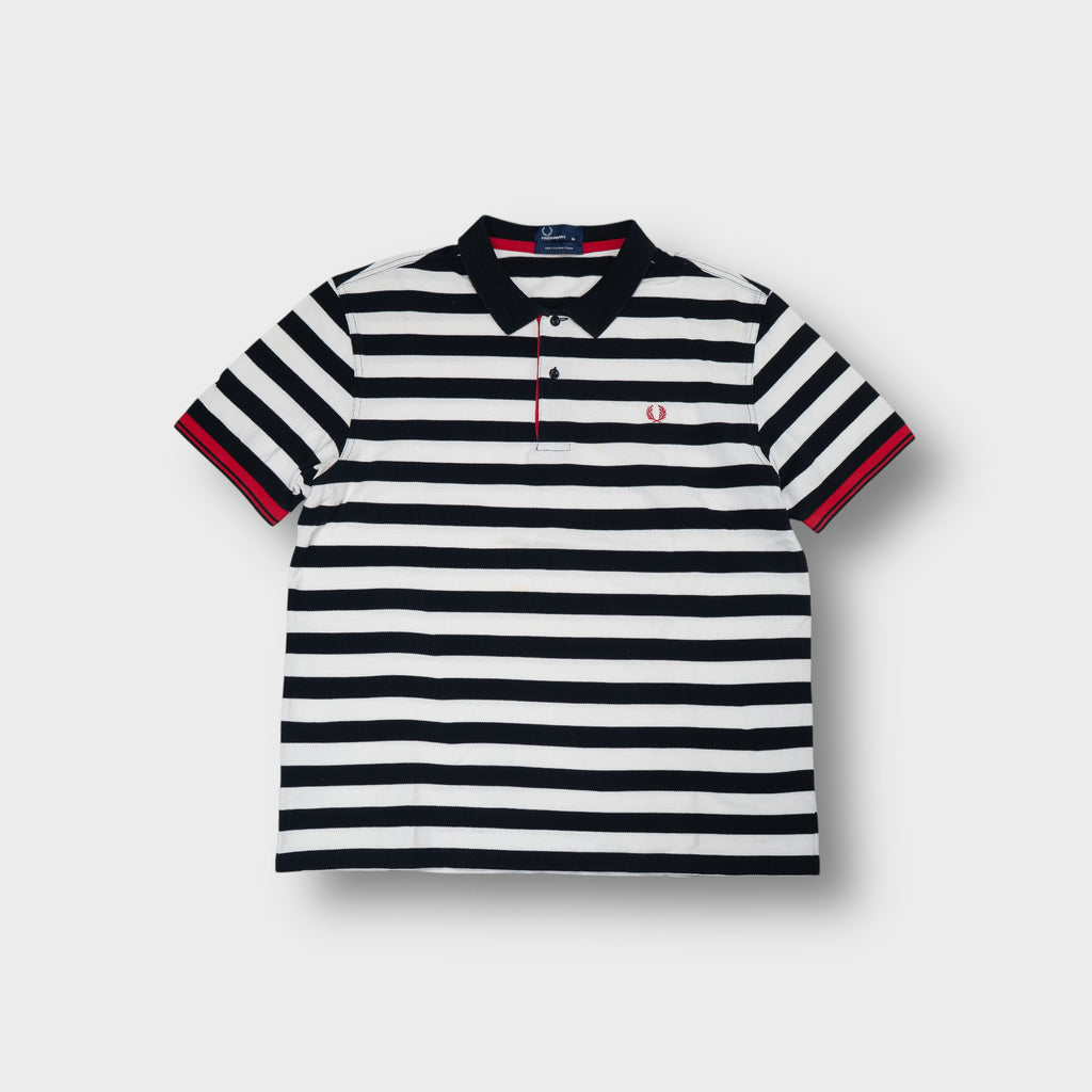 Fred Perry polo shirt in black and white stripes with a red embroidered laurel wreath logo.