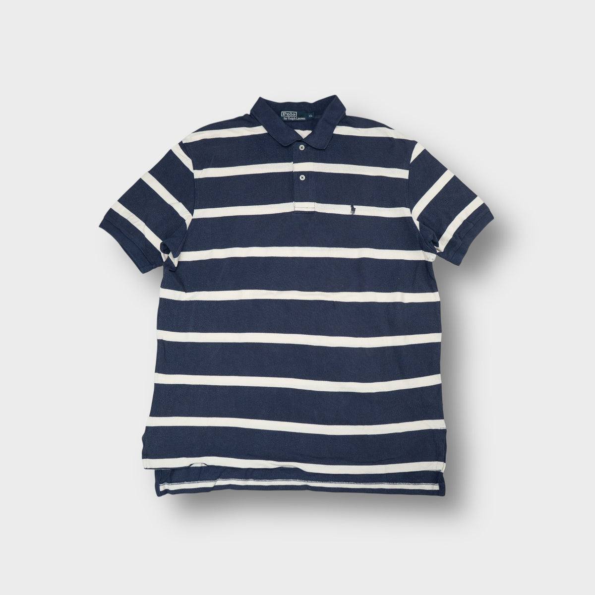 Ralph Lauren polo shirt in blue and white with horizontal stripes and embroidered logo.