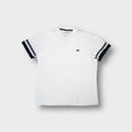 Lacoste polo shirt in white with navy cuff stripes and embroidered crocodile chest patch