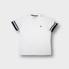 Lacoste polo shirt in white with navy cuff stripes and embroidered crocodile chest patch