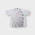 Nike Dri-FIT T-Shirt in white and grey with a red shield logo on the front panel
