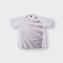 Lade das Bild in den Galerie-Viewer, Nike Dri-FIT T-Shirt in white and grey with a red shield logo on the front panel