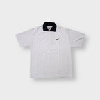 Nike polo shirt in grey with a contrasting black collar and embroidered chest swoosh logo