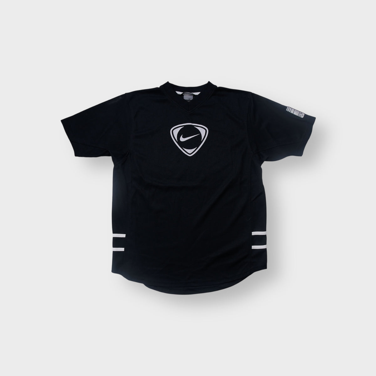 Nike T-Shirt in black featuring a white central swoosh crest logo and V-neck line.