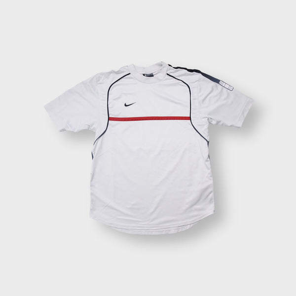 Nike Dri-FIT T-Shirt in white with navy piping and small swoosh logo on chest