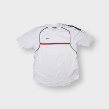 Lade das Bild in den Galerie-Viewer, Nike Dri-FIT T-Shirt in white with navy piping and small swoosh logo on chest