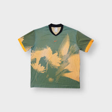 Load image into Gallery viewer, Nike jersey in green and yellow with abstract graphic design and small orange swoosh