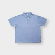 Lade das Bild in den Galerie-Viewer, Nike polo shirt in light blue with an embroidered Nike Court tennis court logo on the chest.