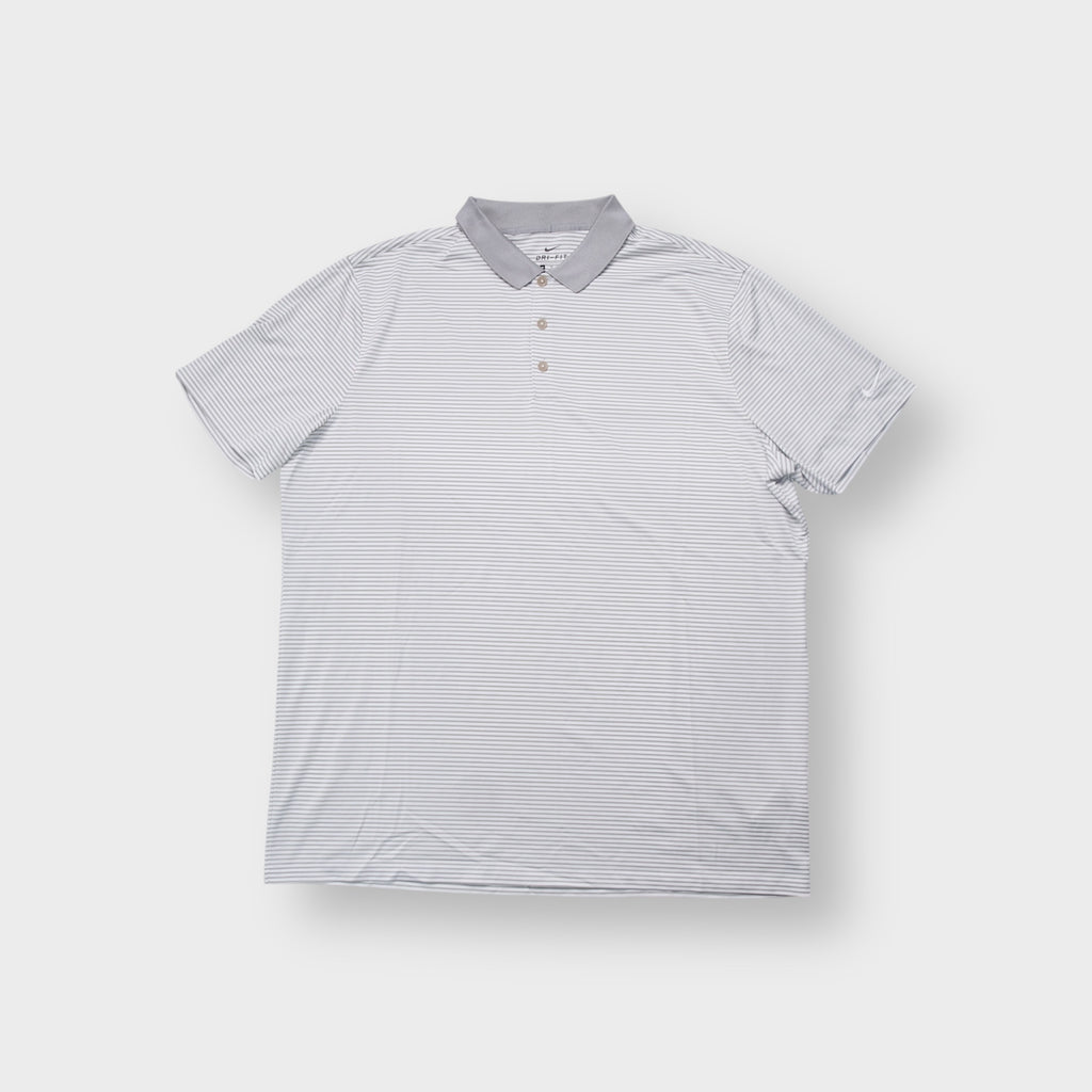 Nike polo shirt in grey and white stripes with embroidered swoosh logo on the sleeve