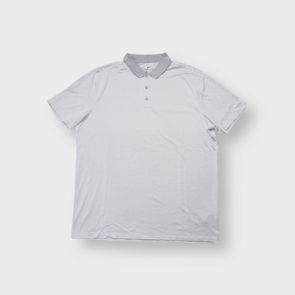 Nike polo shirt in grey and white stripes with embroidered swoosh logo on the sleeve