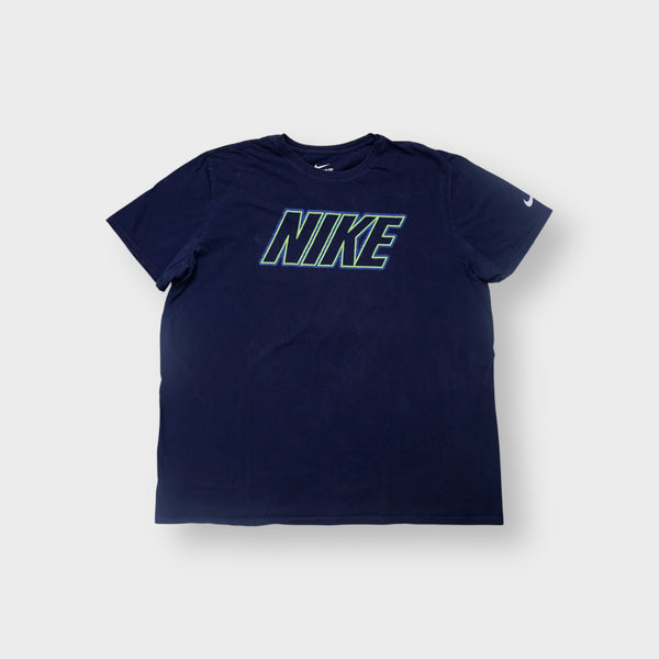 Nike T-Shirt in navy blue with a green outline logo graphic on the chest