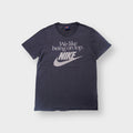 Nike T-Shirt in navy featuring a white printed slogan and Swoosh logo on the front