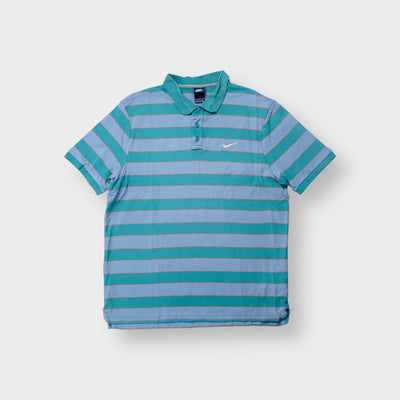 Nike polo shirt in teal and blue striped pattern with white embroidered Swoosh on chest