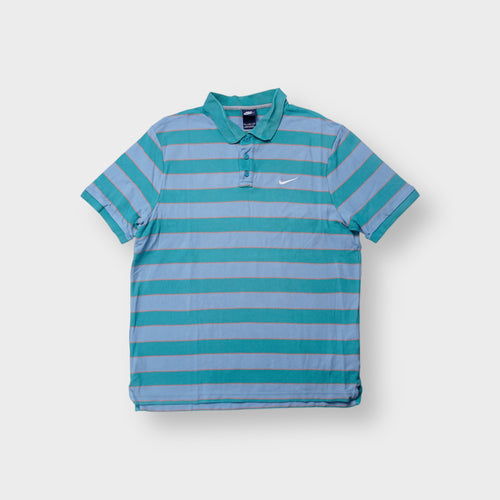 Nike polo shirt in teal and blue striped pattern with white embroidered Swoosh on chest