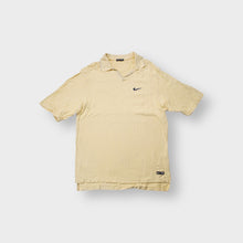 Lade das Bild in den Galerie-Viewer, Nike Golf polo shirt in yellow with embroidered black swoosh logo on chest