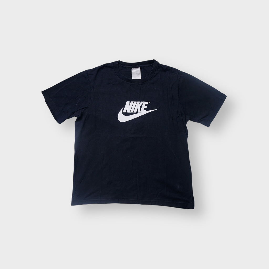 Nike T-Shirt in black with a white printed corporate logo on the chest