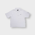 Nike Golf polo shirt in white with a black embroidered swoosh logo on the chest