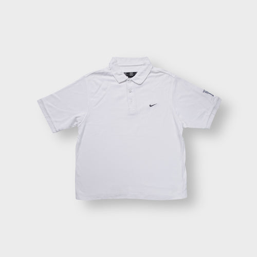 Nike Golf polo shirt in white with a black embroidered swoosh logo on the chest