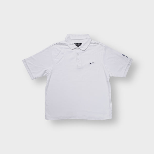 Nike Golf polo shirt in white with a black embroidered swoosh logo on the chest