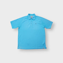 Load image into Gallery viewer, Nike short-sleeve polo shirt in bright blue featuring an embroidered swoosh logo.