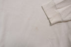 Nike crewneck sweater in beige featuring a small black embroidered Swoosh logo on the chest, detail 2