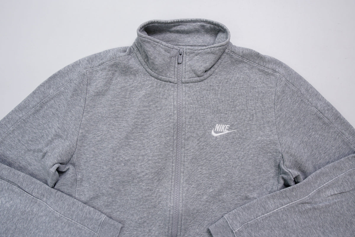 Grey Nike full-zip jacket featuring an embroidered white logo on the chest, full view