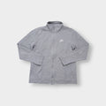 Grey Nike full-zip jacket featuring an embroidered white logo on the chest.