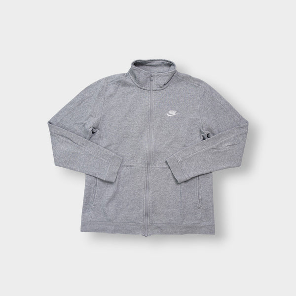 Grey Nike full-zip jacket featuring an embroidered white logo on the chest.