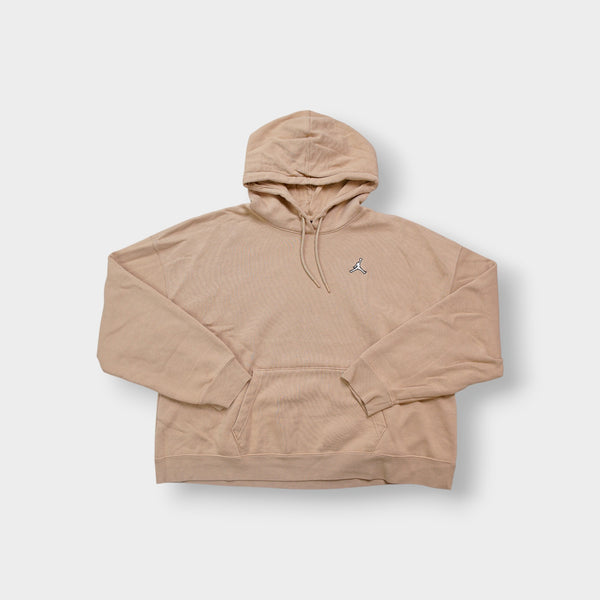 Jordan sweater in beige featuring an embroidered Jumpman logo on the chest