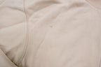 Nike zip jacket in beige featuring a small navy embroidered swoosh on the chest, detail 2