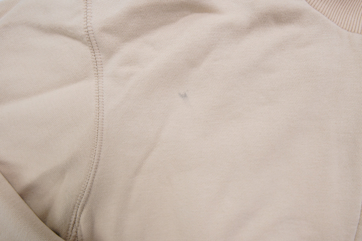 Nike zip jacket in beige featuring a small navy embroidered swoosh on the chest, detail 2