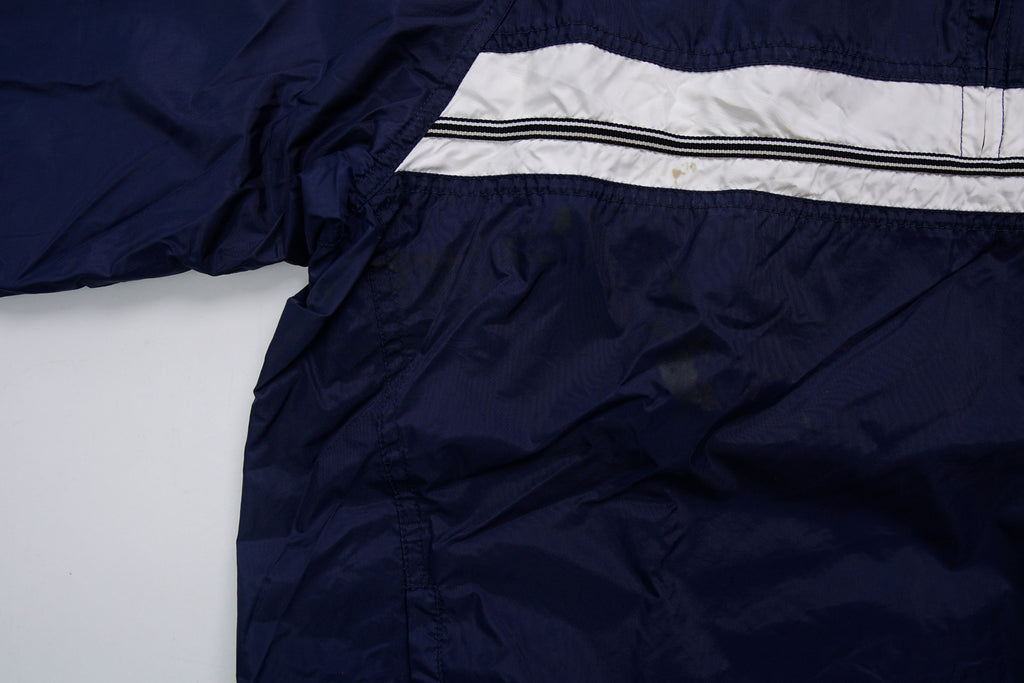 Nike navy jacket featuring a white chest stripe, hooded half-zip, and small embroidered swoosh, detail 2