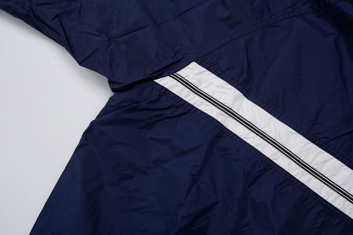 Nike navy jacket featuring a white chest stripe, hooded half-zip, and small embroidered swoosh, detail 3