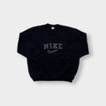 Black Nike sweater with embroidered white spellout logo and Swoosh on chest