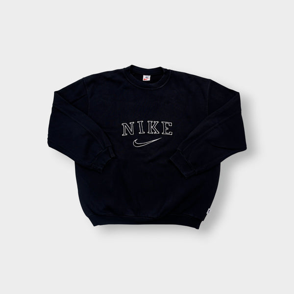Black Nike sweater with embroidered white spellout logo and Swoosh on chest