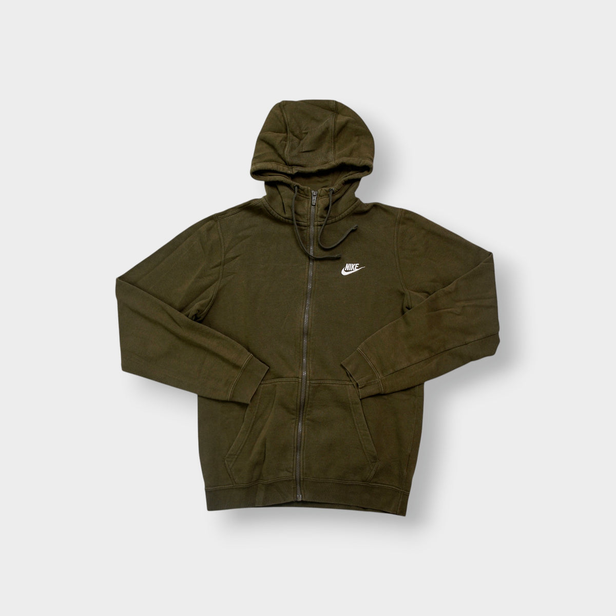 Green Nike zip hoodie featuring a white embroidered logo on the chest